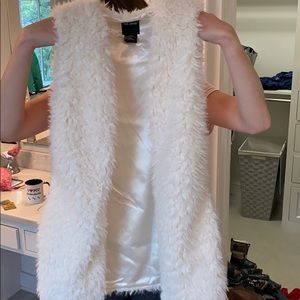 white fur vest
